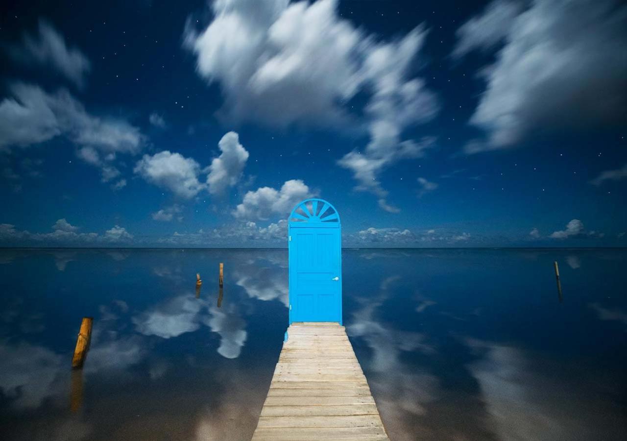 Puerta Azul Hotel Sandy Bay Kültér fotó