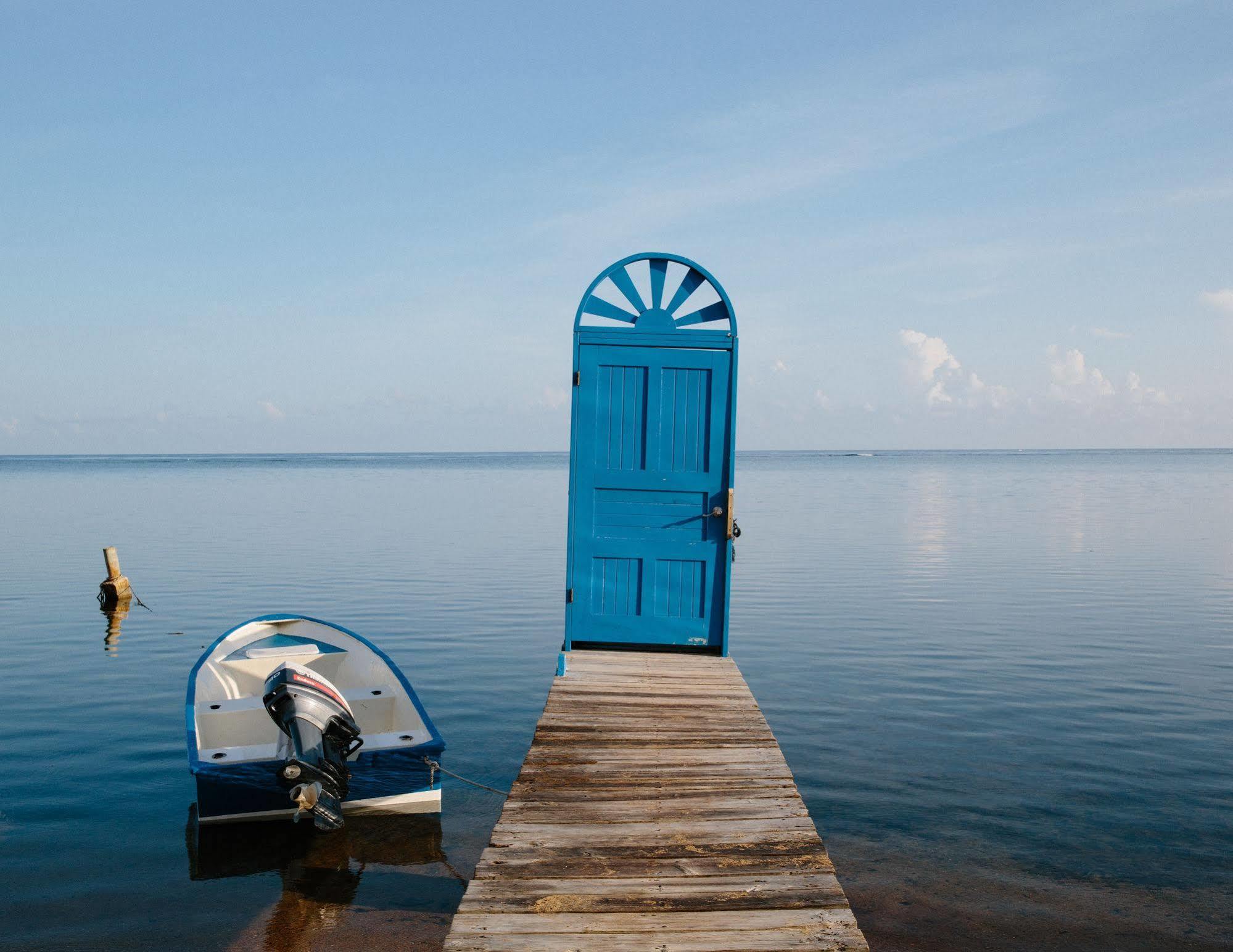 Puerta Azul Hotel Sandy Bay Kültér fotó